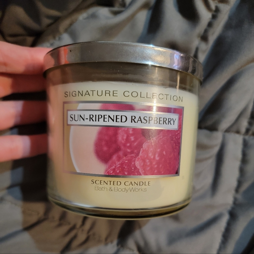 Sun ripened raspberry bath and body works candle.